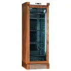WEINKÜHLSCHRANK - Mod ENY 420 N NM - STATISCH - TEMPERATUR °C +4/+18 - N. 1 GLASTÜR - STRUKTUR AUS MITTLEREM NUSSBAUMHOLZ - BRUTTOFÜLLMENGE Lt. 382 - NETTOFÜLLMENGE Lt. 342 - LEISTUNG W 230 - SPANNUNG 220/50Hz EINPHASIG - PRODUKTMAßE (BxTxH) cm 65,5 x 63,